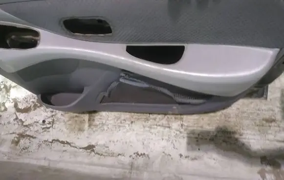 Nissan Almera Tino Front door card panel trim