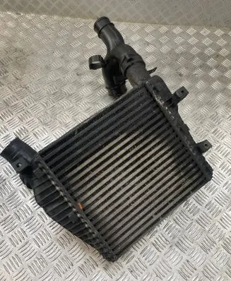 Volkswagen Touareg I Intercooler radiator 7L6145803