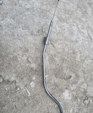 Oil level dip stick