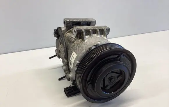 KIA Sportage Air conditioning (A/C) compressor (pump) 97701D7600