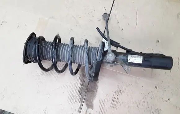 Ford Focus Front shock absorber with coil spring BV6118K001AAC