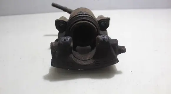 Volkswagen Golf VI Front brake caliper