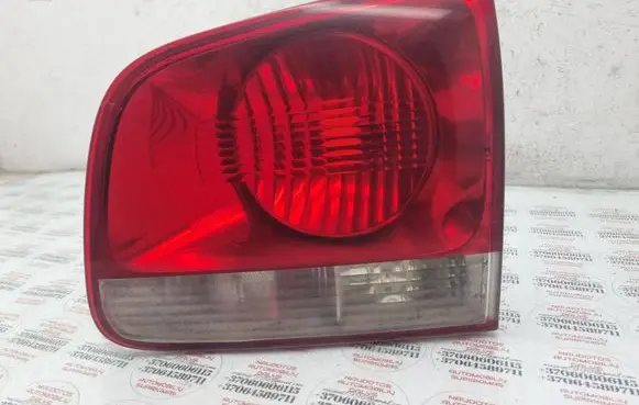 Volkswagen Touareg I Tailgate rear/tail lights 7L6945094H