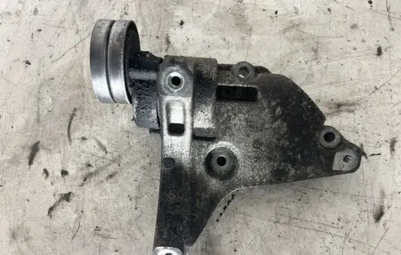 Audi A1 A/C compressor mount bracket 03F260885