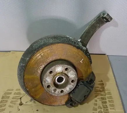 Front wheel hub spindle knuckle