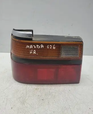 Mazda 626 Tail light bulb cover holder 0436888L