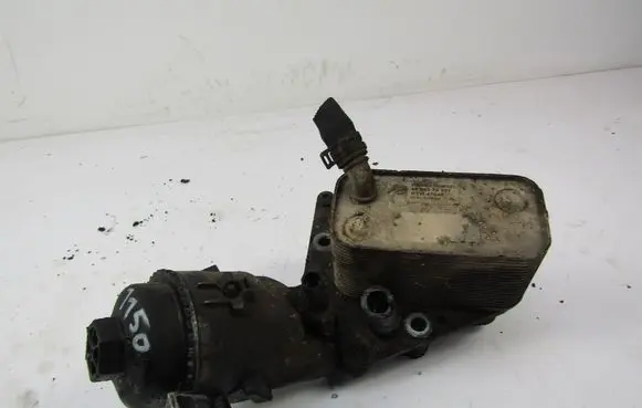 Opel Zafira B Oil filter mounting bracket 