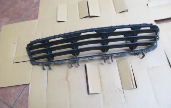 Opel Astra H Front bumper lower grill 24460271