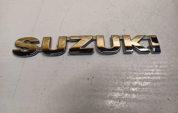 Suzuki Baleno EG Manufacturer badge logo/emblem 