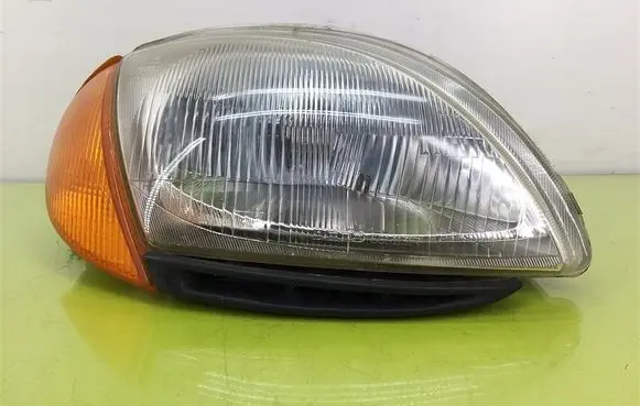 Fiat Seicento/600 Headlight/headlamp 661113R