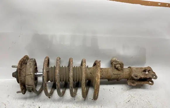 Front shock absorber with coil spring