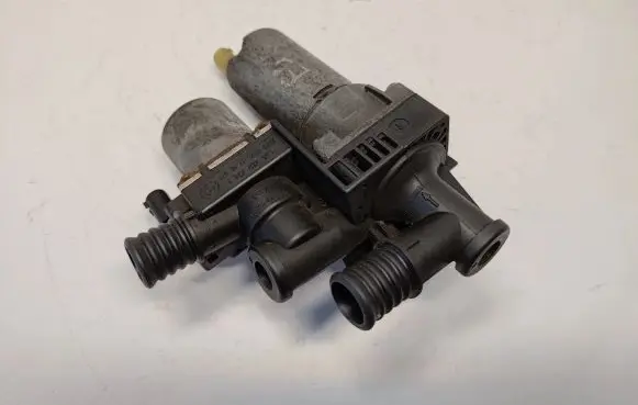 Coolant heater control valve