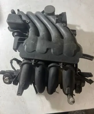 Volkswagen Golf IV Intake manifold 06A133205E