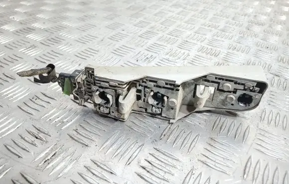 Tail light bulb cover holder