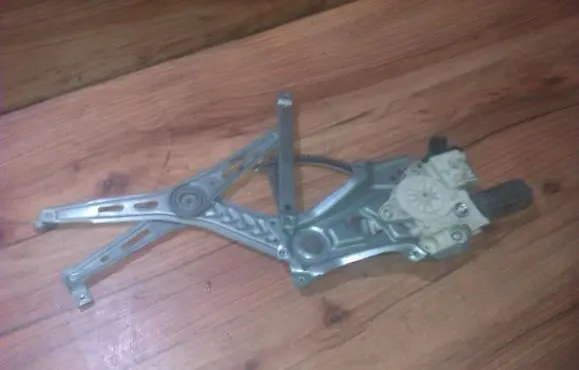 Sliding door window regulator with motor