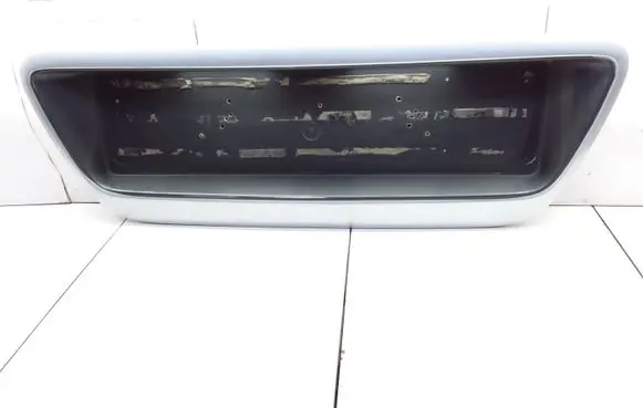 Trunk door license plate light bar