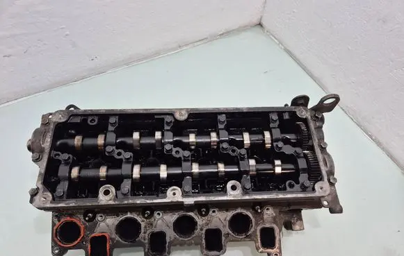 Volkswagen PASSAT B7 Engine head 03L103373A