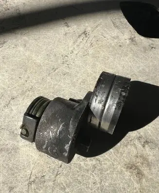 Generator/alternator belt tensioner
