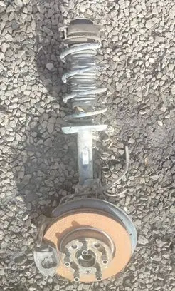 Front shock absorber with coil spring