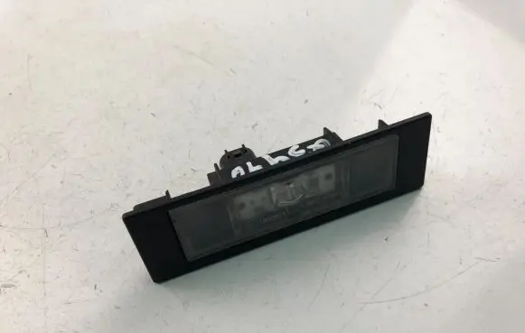 BMW 1 E81 E87 Trunk door license plate light bar 7193294