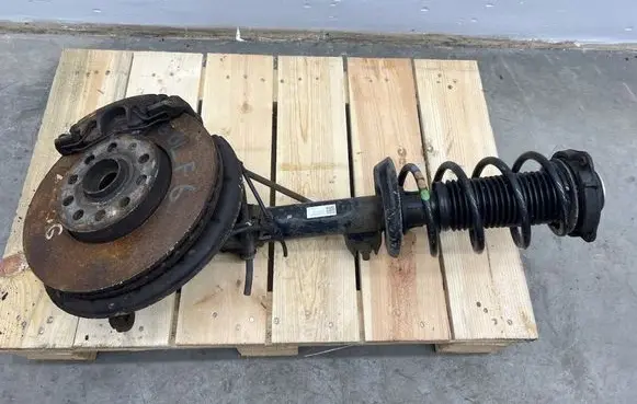Volkswagen Golf VI Front shock absorber with coil spring 1T0413031HN