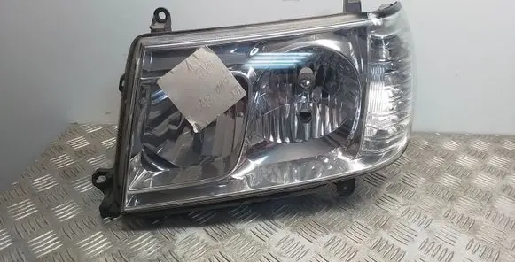 Toyota Land Cruiser (J100) Headlight/headlamp 06112
