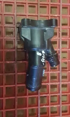 Thermostat/thermostat housing