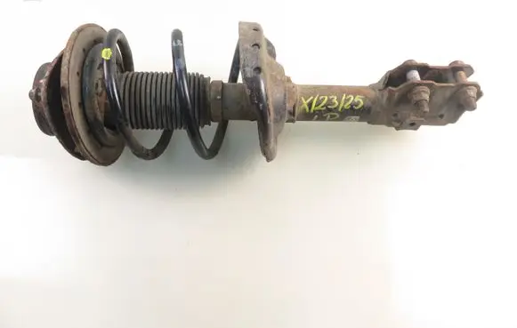Subaru Impreza III Front shock absorber with coil spring