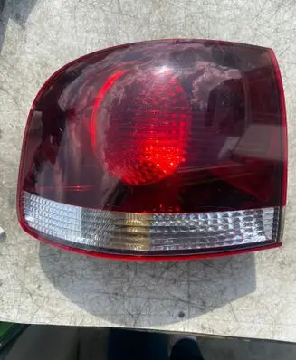 Volkswagen Touareg I Tailgate rear/tail lights 7L6945095R