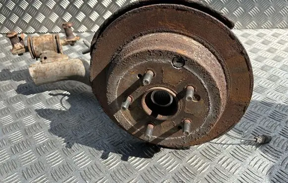 Rear wheel hub spindle/knuckle