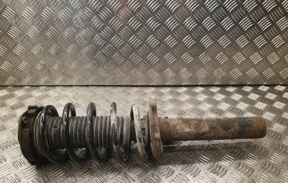 Volkswagen Caddy Front shock absorber with coil spring