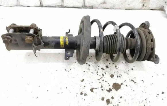 Renault Megane III Front shock absorber with coil spring