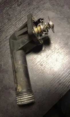 Thermostat/thermostat housing