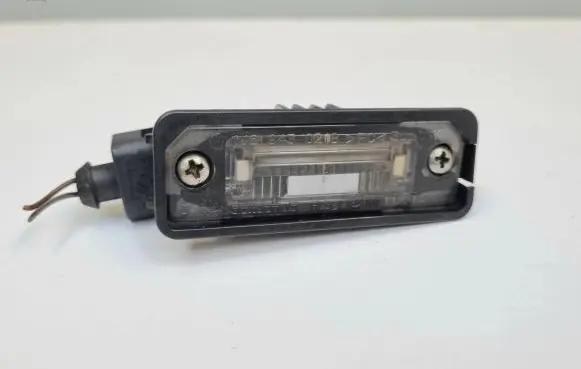 Volkswagen Golf V Number plate light 1J6943021B