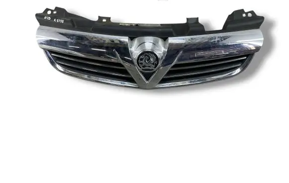 Opel Zafira B Front bumper upper radiator grill 13247331