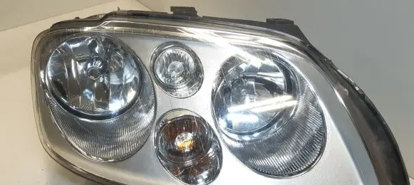 Volkswagen Touran I Headlight/headlamp 0301205201