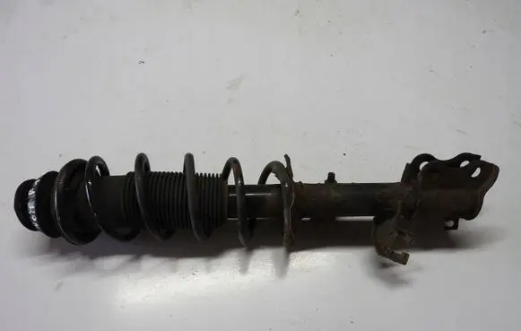 Nissan Note (E12) Front shock absorber with coil spring 8200973738