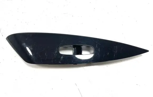 Nissan Leaf I (ZE0) Front door window switch trim 809613NM0A
