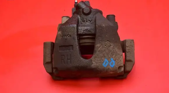 Mazda 3 II Front brake caliper