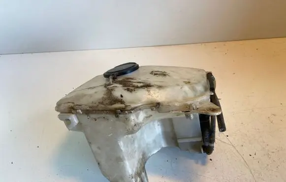 Toyota Corolla E100 Windshield washer fluid reservoir/tank 060351618