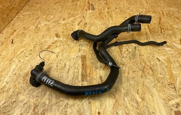 Volkswagen Golf VII Engine coolant pipe/hose 5Q0121049AD