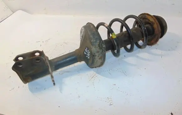 Renault Kangoo I Front shock absorber with coil spring 7700314021 03051000524 8200675686