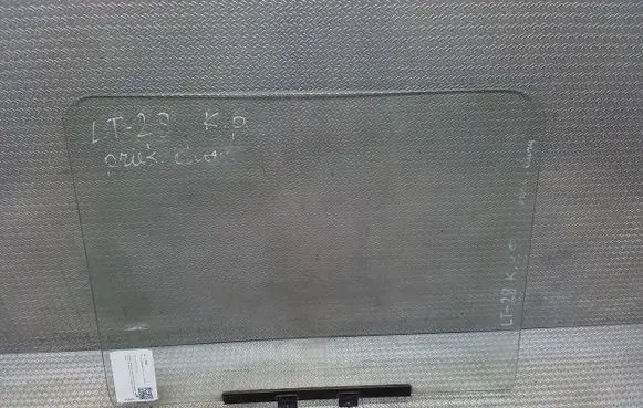 Volkswagen I LT Front door window glass four-door