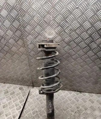 Volkswagen Caddy Front shock absorber with coil spring