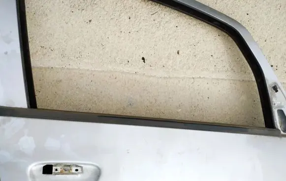 Mitsubishi Colt Front door glass trim molding 