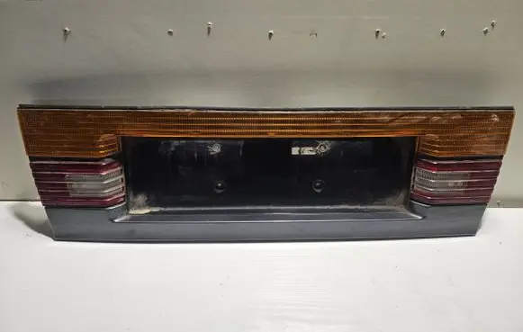 Mazda 626 Rear light center trim bar blend 0437835 0437835R