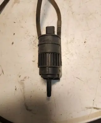 Nissan Almera N16 Windscreen/windshield washer pump 7700430702