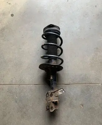 Nissan X-Trail T31 Front shock absorber with coil spring 54302JG72A 824903003777