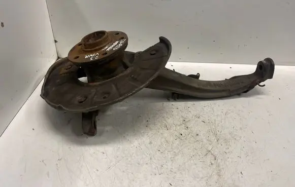 Volkswagen Touareg I Front wheel hub spindle knuckle 7L6407257A