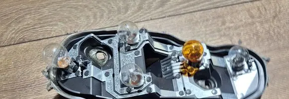 Opel Corsa D Tail light bulb cover holder 89037853